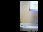 bouncing on my dildo in the bathroom