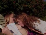 Kitty Marie and Molly Rome play outdoors