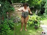 Shapely GILF Masturbates In Her Garden