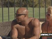 A pool party with swingers can turn into a massive orgy when a mature couple start fucking at it.