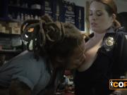 Big breast female cop is getting banged hard by a black suspect in his workshop.