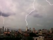 Lightning strikes three of the tallest buildings in Chicago at the same tim