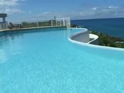 Gorgeous Babe In Pool By Ocean