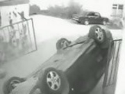 Woman Flips Car Through Gate