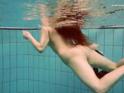 'Swimming pool babe Vesta strips naked'