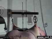 Extreme Femdom with bizarre breasts bondage