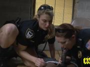 Two sexy MILFs cops love sucking black dick while they are on duty.