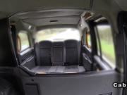 Cheated busty Brith has oral sex in cab