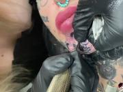 Australian bombshell Amber Luke gets a new chin tattoo