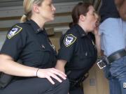 Milf big titted officers bend over a huge black penis to get their pussy slammed after sucking it.