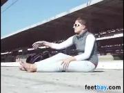 Chick Smokes With Her Feet Out
