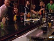 Swingers get together at a bar to have a pre party celebration