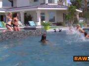 Stunning swinger girls are horny and sunbathing next to the pool side.