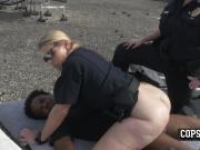 Sexy busty cops in uniforms seduce and bang a black guy in a rooftop. His massive dick slides deep.