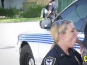 Desiring female cops gobble up on a hard black arrested cock