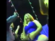 Busty Arab belly dancer in hot blue dress in the nightclub