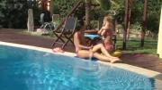 Adorable Girls Doing Their Thing Near Pool