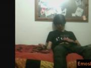 Black hiared and smoking emo getting his hands in his p