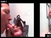 Gay brunette fellating large cock on gloryhole