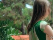 Outdoor solo of Gloria stripping and rubbing cunt