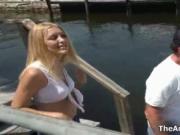 Cute blonde babe gets horny talking with a guy outdoor