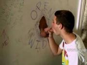 Hot twink Aiden Jason sucks cock trough a gloryhole