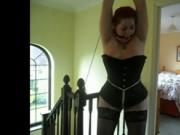 slave Alexa tied to the ceiling and whipped