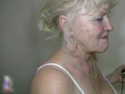 Nasty blonde mature slut gets horny showing off her tit