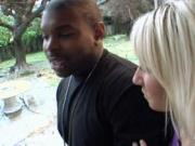 Horny blonde slut seducing black neighbor with striptea