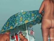 Nude sun tanning girls expose themselves to a beach spy