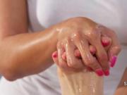 Two busty lesbians have massage sex