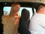 Blonde amateur hottie showing tits in the sex bus