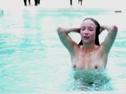 Gorgeous teen gets horny swimming naked on a pool by HD