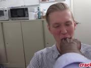 Blonde stud sucking black cock on knees in office