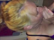 Blonde granny sucking a young cock