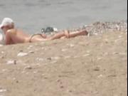 Greek Beach Voyeur Topless Blonde Eating Chips On Beach