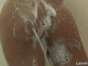Hot latin babe rubbing wet twat while taking a bath by