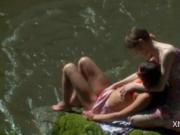 Natasha Shy and Beata kissing and stripping by the rive