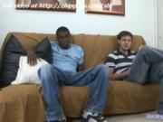 Ebony and white guy sitting on the bed and jerked off