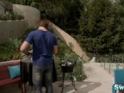 Swingers enjoying outdoor party in reality show