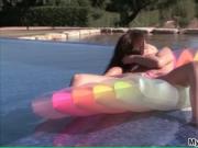 Two extremely hot babes having lesbian fun in the pool