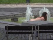 Busty slave bathing in fountain outdoor