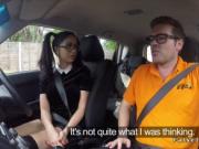 Beauty in glasses bangs driving instructor
