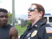 Black dude banging two busty cops