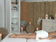 Oiled lesbians on massage table