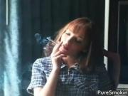 Aamazing redhead is smoking and showing her great body