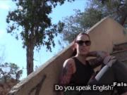 Tattooed redhead sucks cock to fake cop outdoor