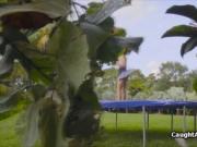 Voyeur fucks big tit on trampoline in the garden