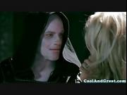 Blonde in black outfit gagging on cock