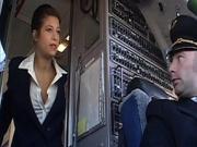 Horny stewardess seduces the pilot in his cockpit